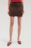 Mini skirt with applied leather pockets