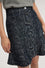 Falda mini en jacquard con estampado pitón