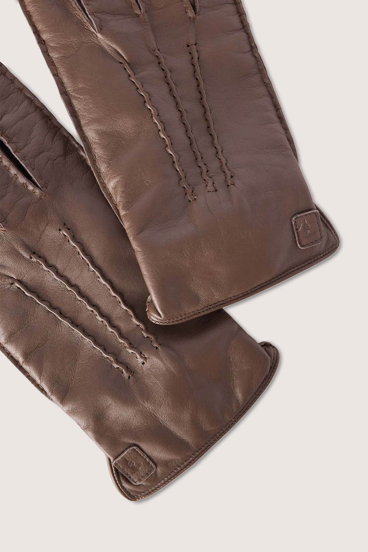Guanti in pelle martellata con nervature 1|3e2b77064082ee2d5e1e91812c7e44edea918b098fd6c574e6d00efb0085083c