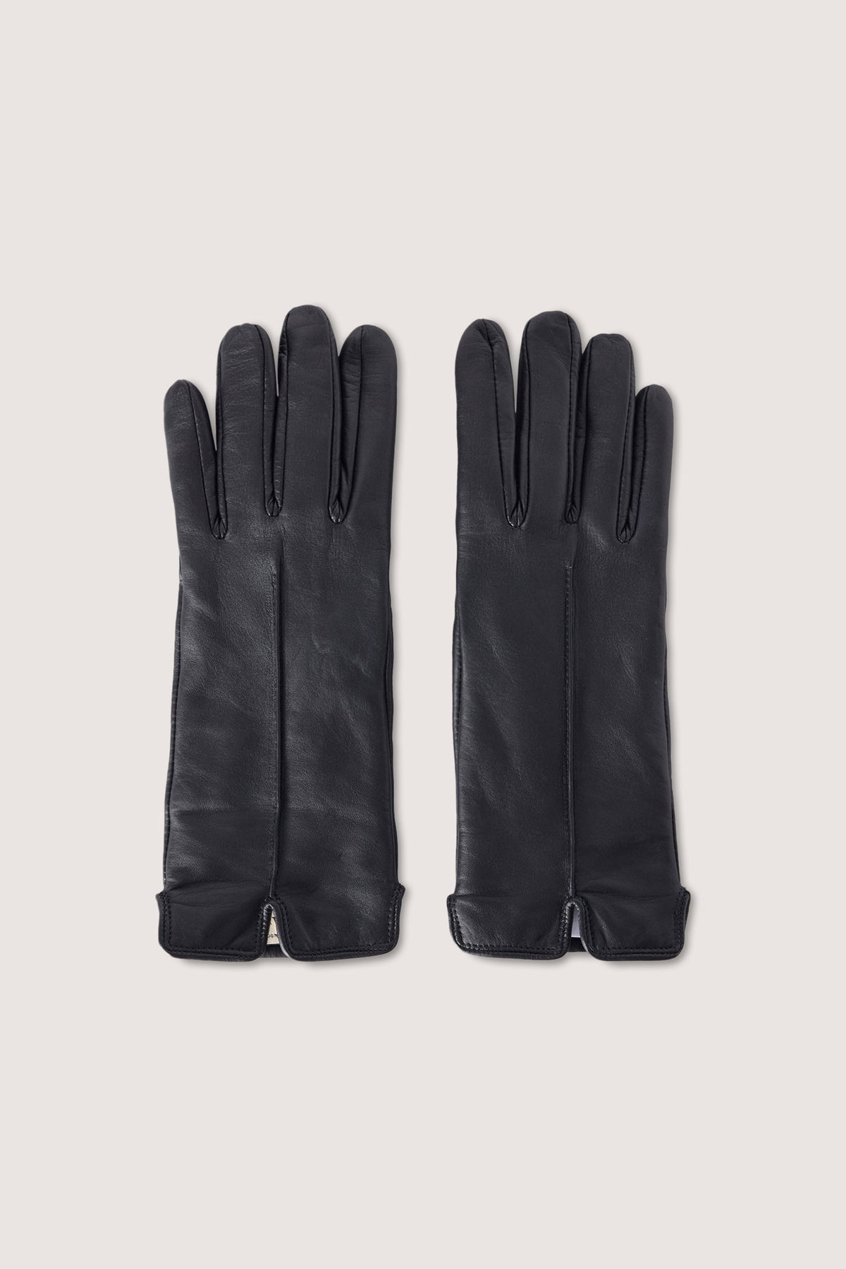 Guanti in pelle martellata con taglio frontale 1|8c3cd1c49a485799667e1c2f89c7666b5232944215f91775053afc585a00682b