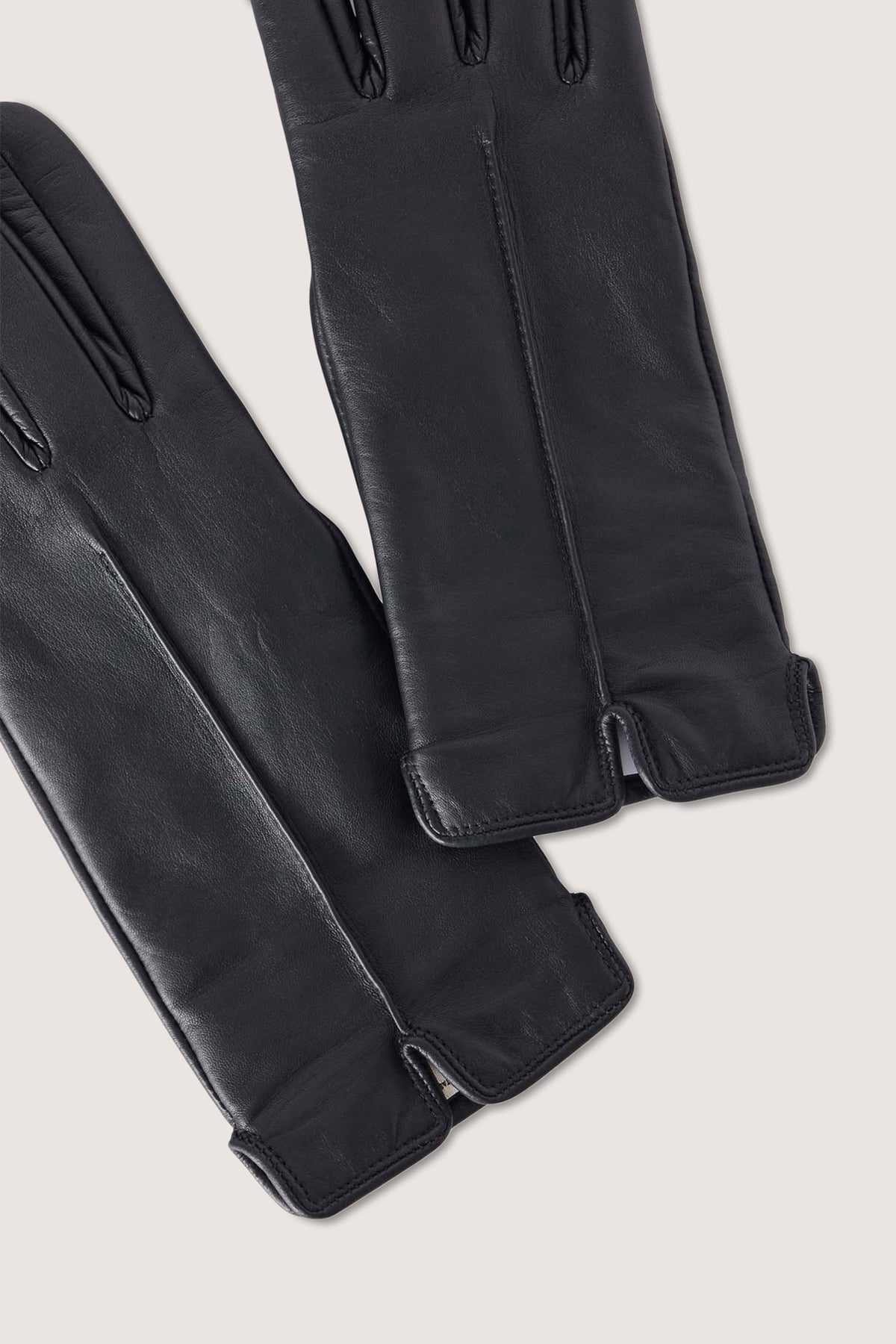 Guanti in pelle martellata con taglio frontale 3|b5e47a2c4e3689d130f9ad69e63cf22858e8ee07548d258f937774b2389fc313