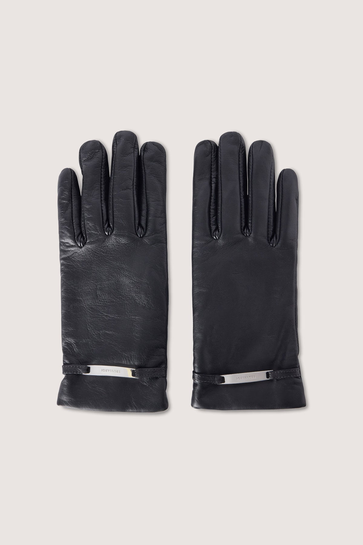 Guanti in nappa con applicazione metallica 1|b0f3d46e3d63e4d0e8b85512bc19a8525f4bf211ccfc0c9414a65159c8f85a50