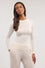 Wool jersey knit top with ribbed edges