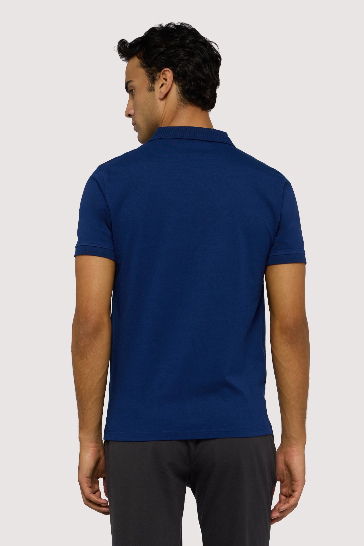 Polo slim fit in piquet stretch 2|5600be77e67eb875c3c7e9c0c64ca96682a8dc8bcba33b18233a474e35a9ae3f