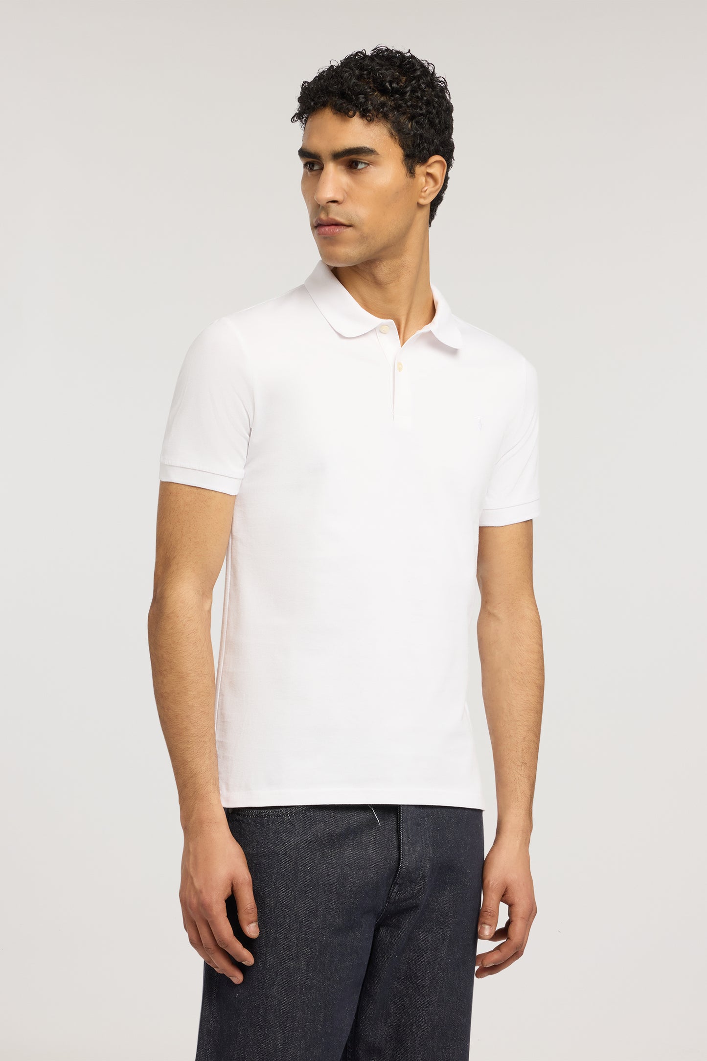 Polo slim fit in piquet stretch 1|990edb99577d9d439b242cb135138dfebc756fc2d9fa3bea0efc6193fe2cd85d