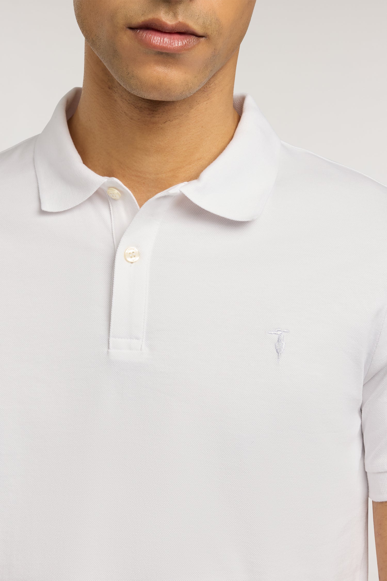 Polo slim fit in piquet stretch 3|d1a5d60bcb7dea96f359543ad23d6e3522c924c11bbfbd680ceaaffd53cca617