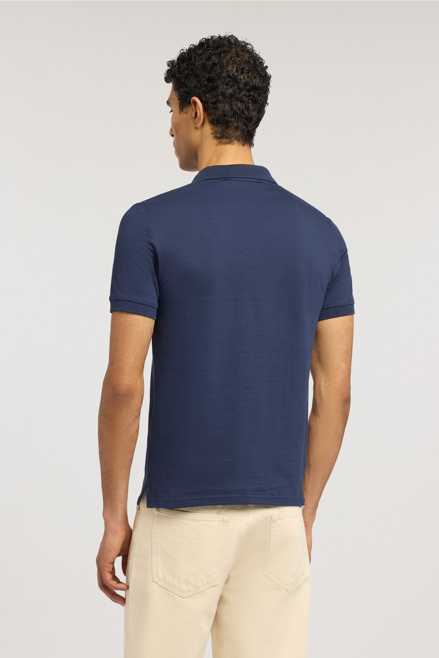 Polo slim fit in piquet stretch 2|8e88ee39433f8f9a96085c00146acd806d50b12cf2d24ffb3bf5cd3f1a17e515