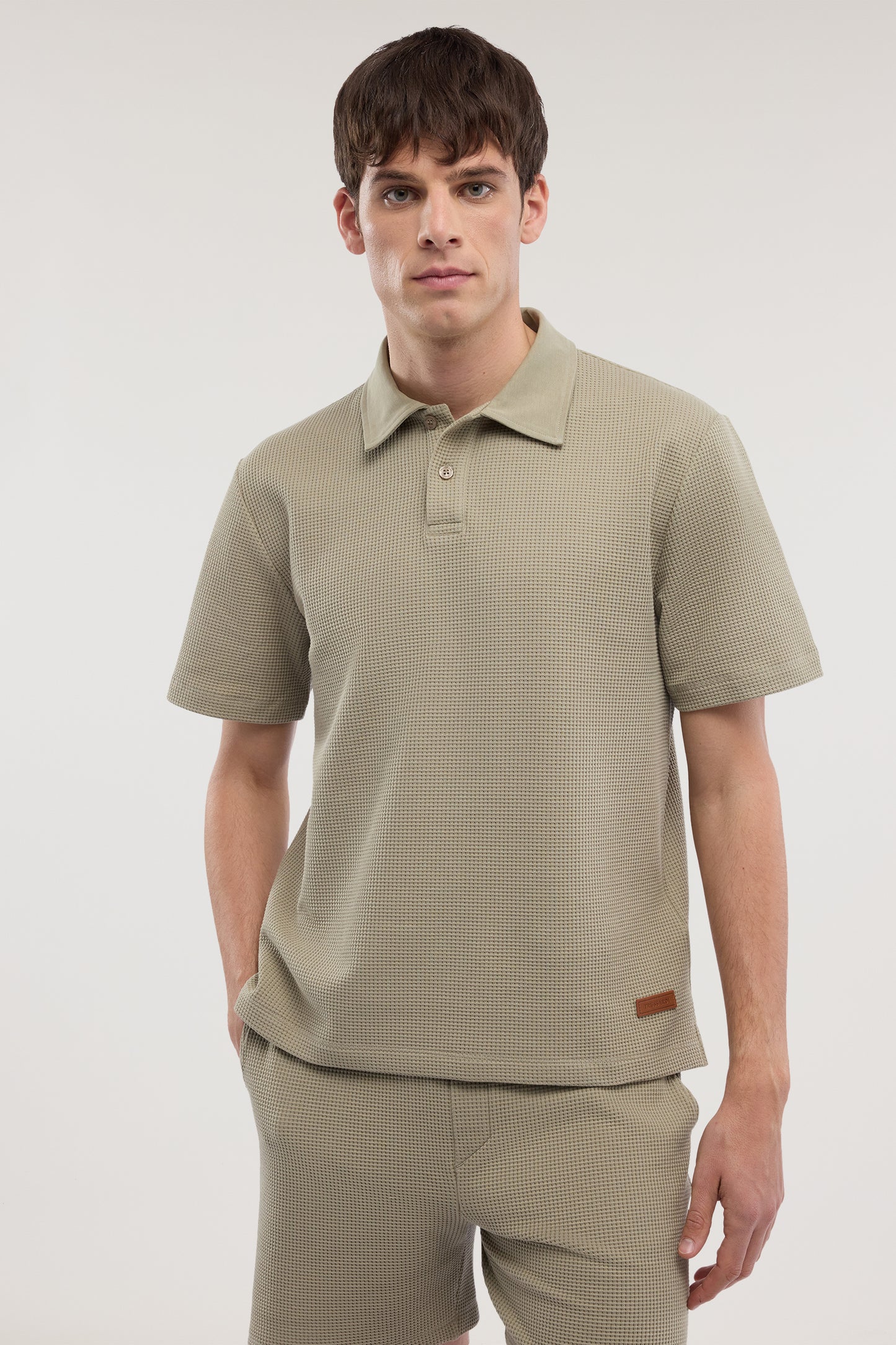 Polo in jersey effetto waffle 1|2158595ca79e250a72581854a83395bb815691727df4fa1bca962fe1c1f79181