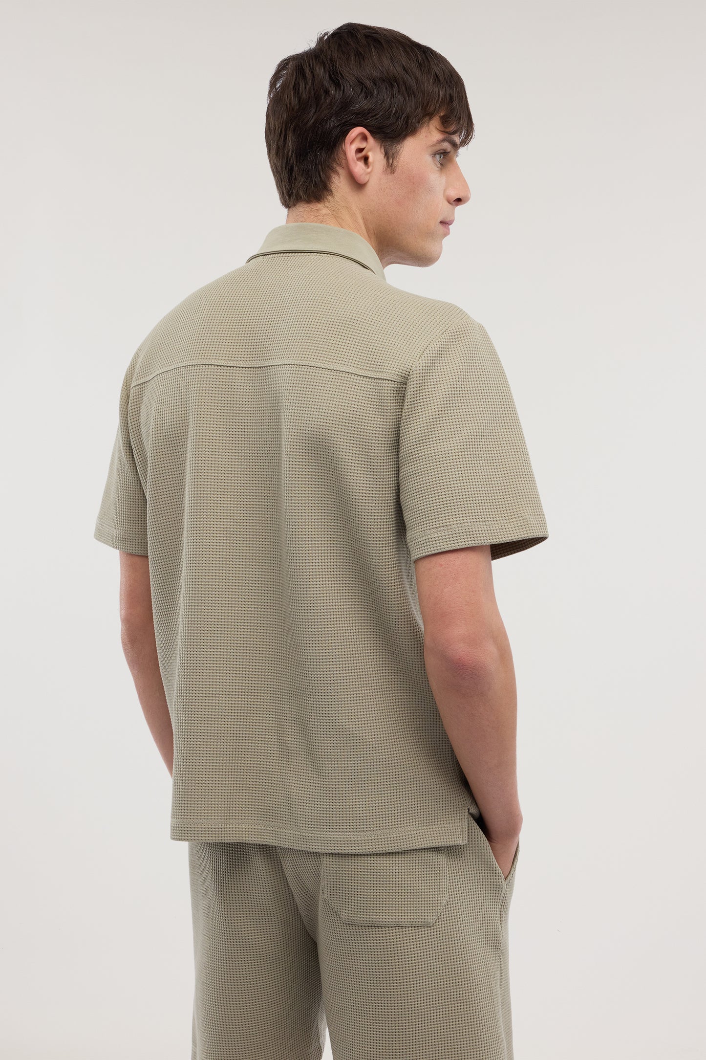Polo in jersey effetto waffle 2|98b97c134de42c12ec10b4f466c42abe86ca741943d1246a745c18d1a5bad611