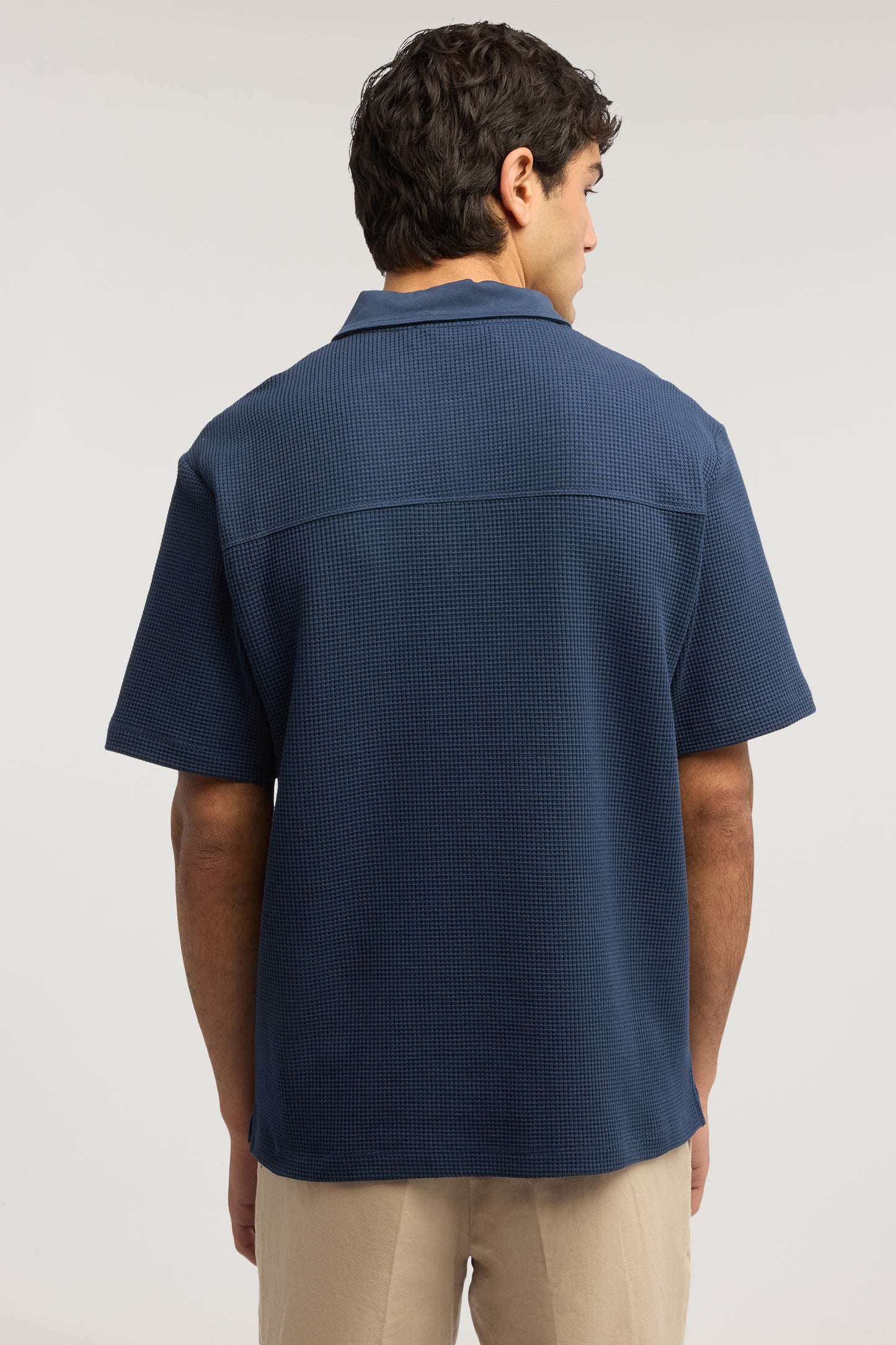 Polo in jersey effetto waffle 2|54d3d6eeb596cb55c1b99e4db374af6d044e4b46e0ac92f8d5af4b2b71fd699c