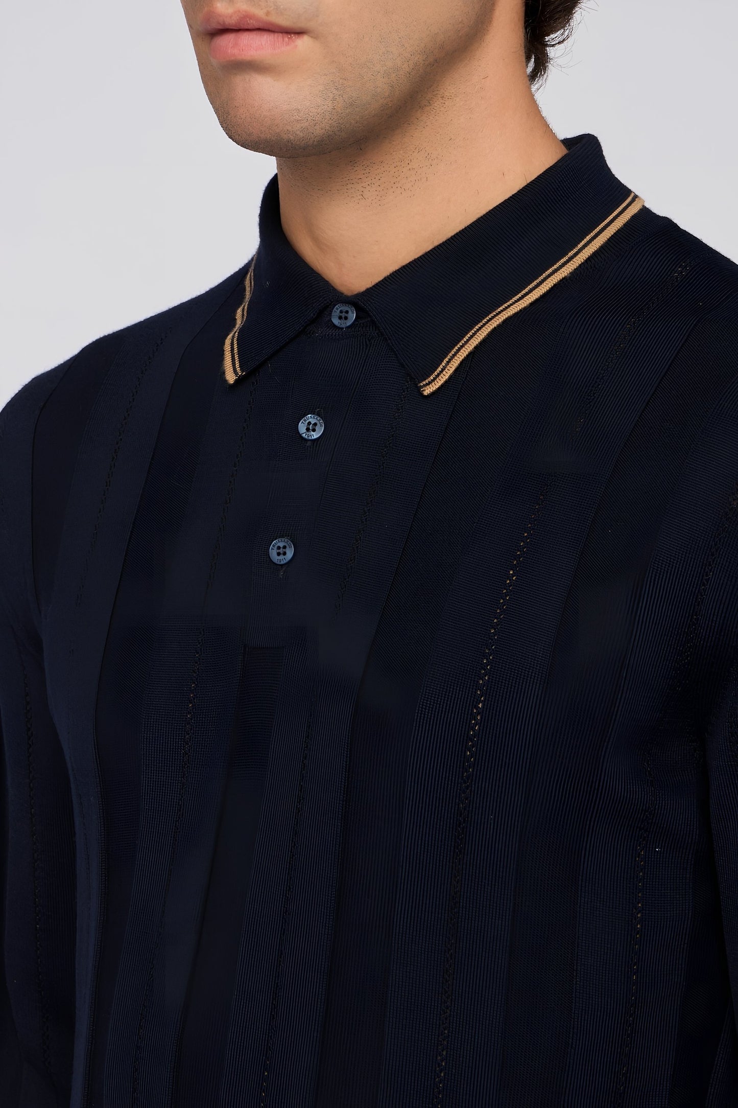Polo a maniche lunghe in pura lana a coste 3|5773f9685cbabedcbb00976d08689f8e6f138cc59225c3133063e19f402a7d6a