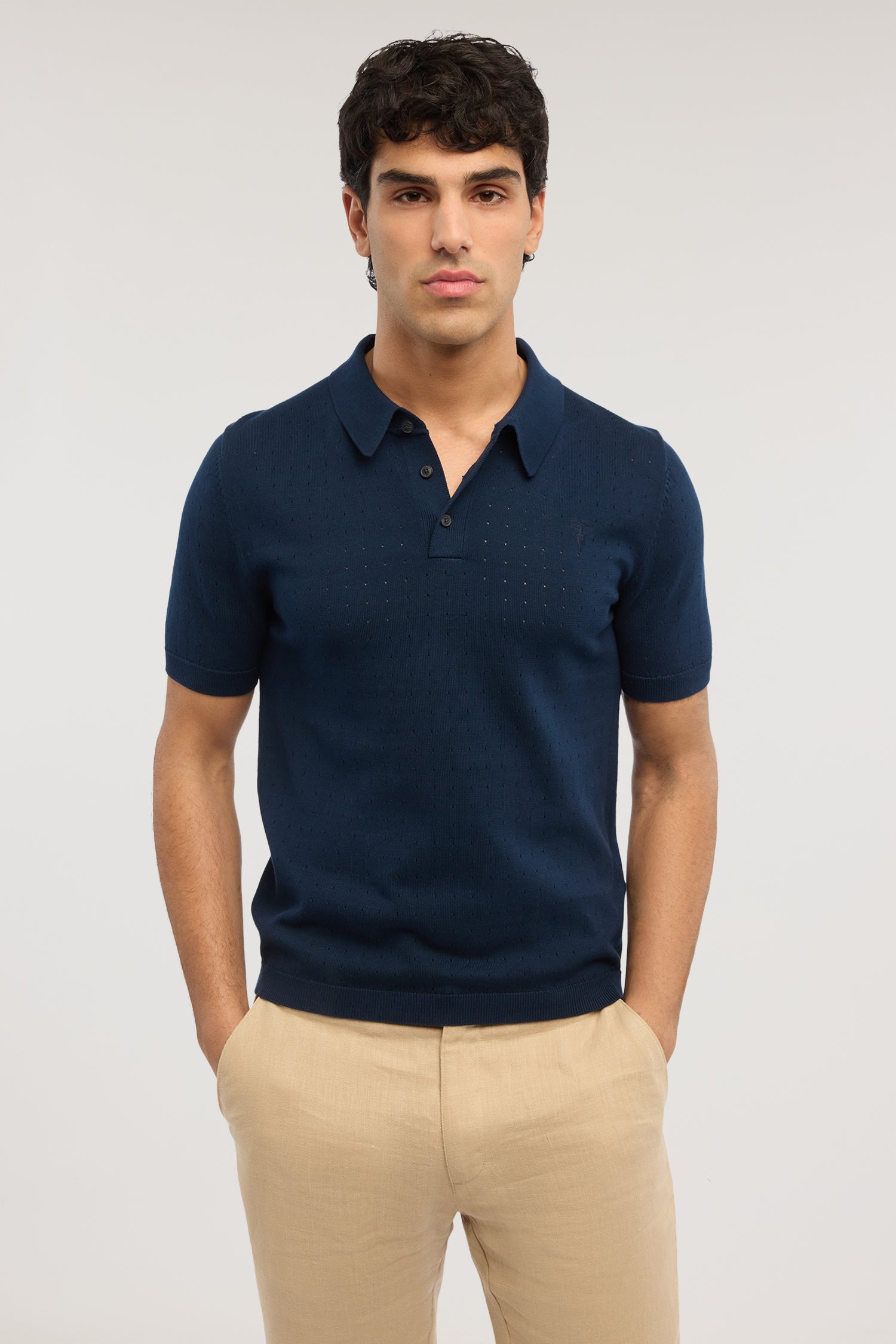 Polo effetto punzonato in cotone 1|64d6778e6b87f22b48066635720ba3ba896133bd8f01198b5f5d07fd5859f8f9