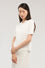 Polo crop in maglia di viscosa punto milano