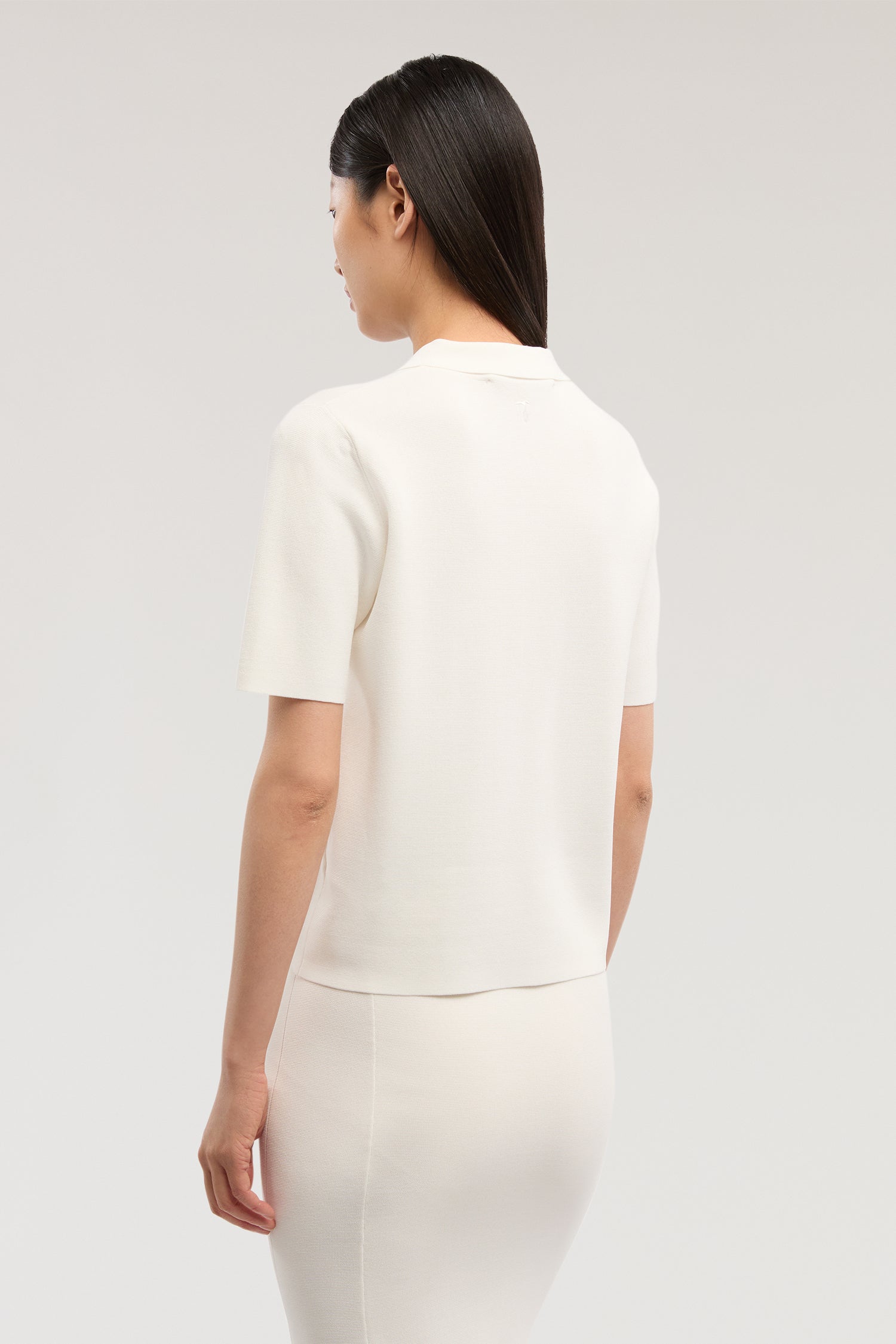 Polo crop in maglia di viscosa punto milano 2|c1d43841fcae30a61740136f3e97fe36abdc0c01c393b8741ea04c8459498909