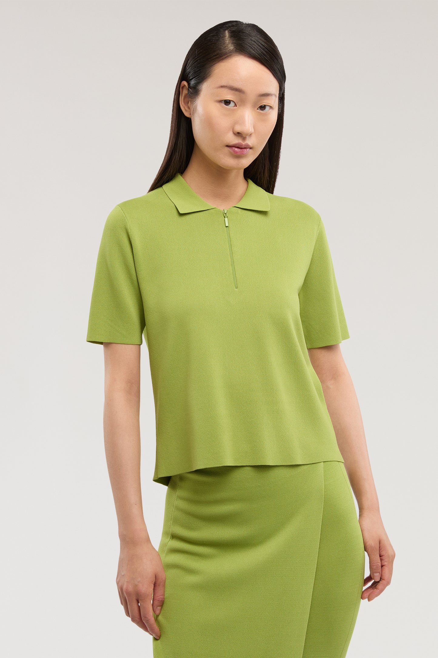 Polo crop in maglia di viscosa punto milano 1|282056ce8546c2538287efa4212ba8a1767f957093eaf109abcc8cf5e7bad883