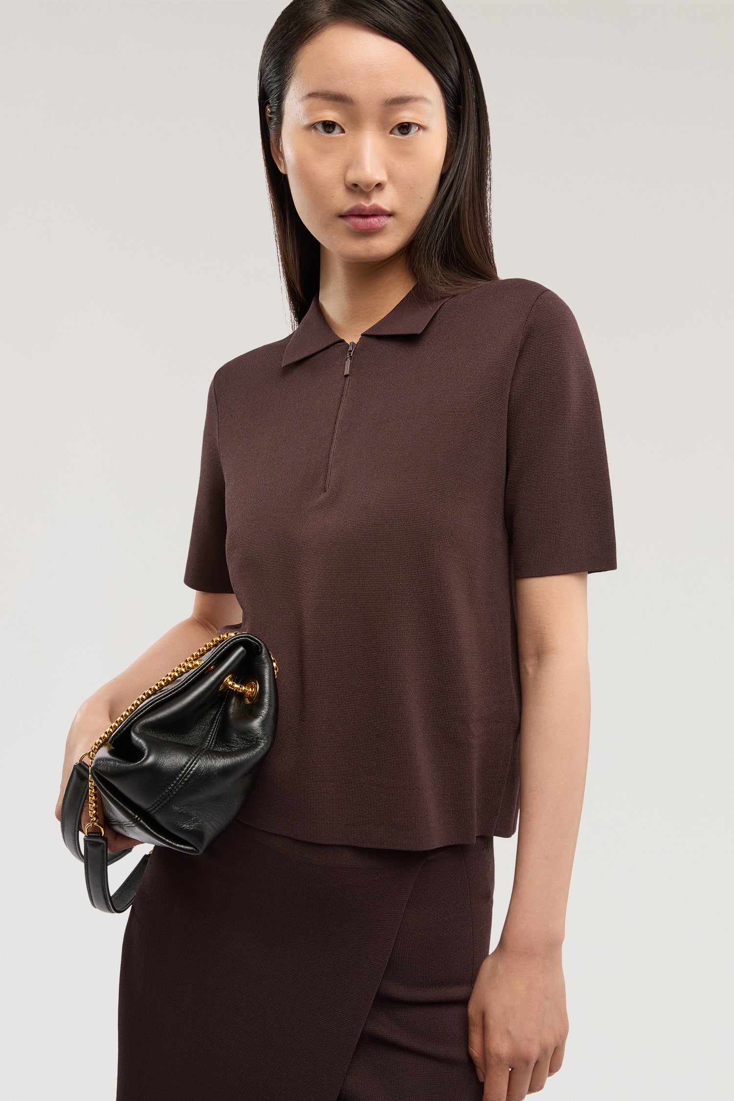 Polo crop in maglia di viscosa punto milano 1|06e270485633c21e130f238c4deab2331b491cbc710060bab6c38c19670db646