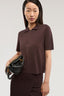 Polo crop in maglia di viscosa punto milano 1