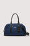 Travel holdall in nylon and leather